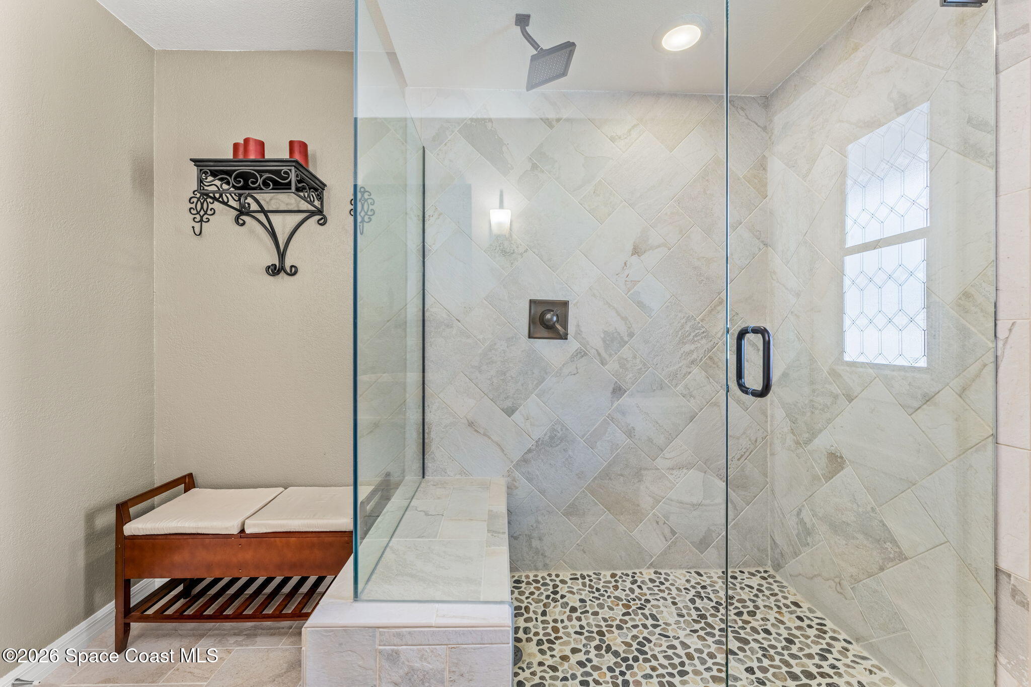 31 Fairway Drive Cocoa Beach, FL 32931 - Photo 22 of 53 a bathroom with a shower