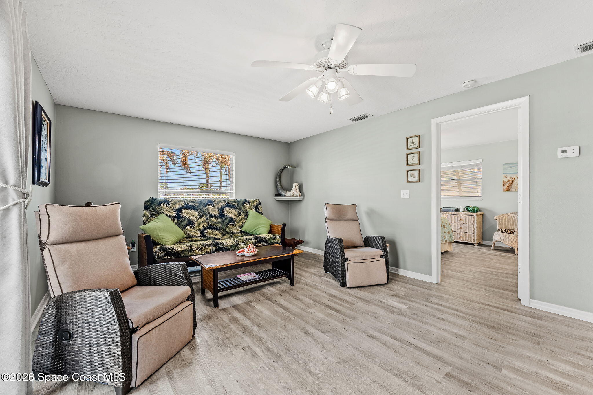 31 Fairway Drive Cocoa Beach, FL 32931 - Photo 26 of 53 a living room with furniture and wooden floor