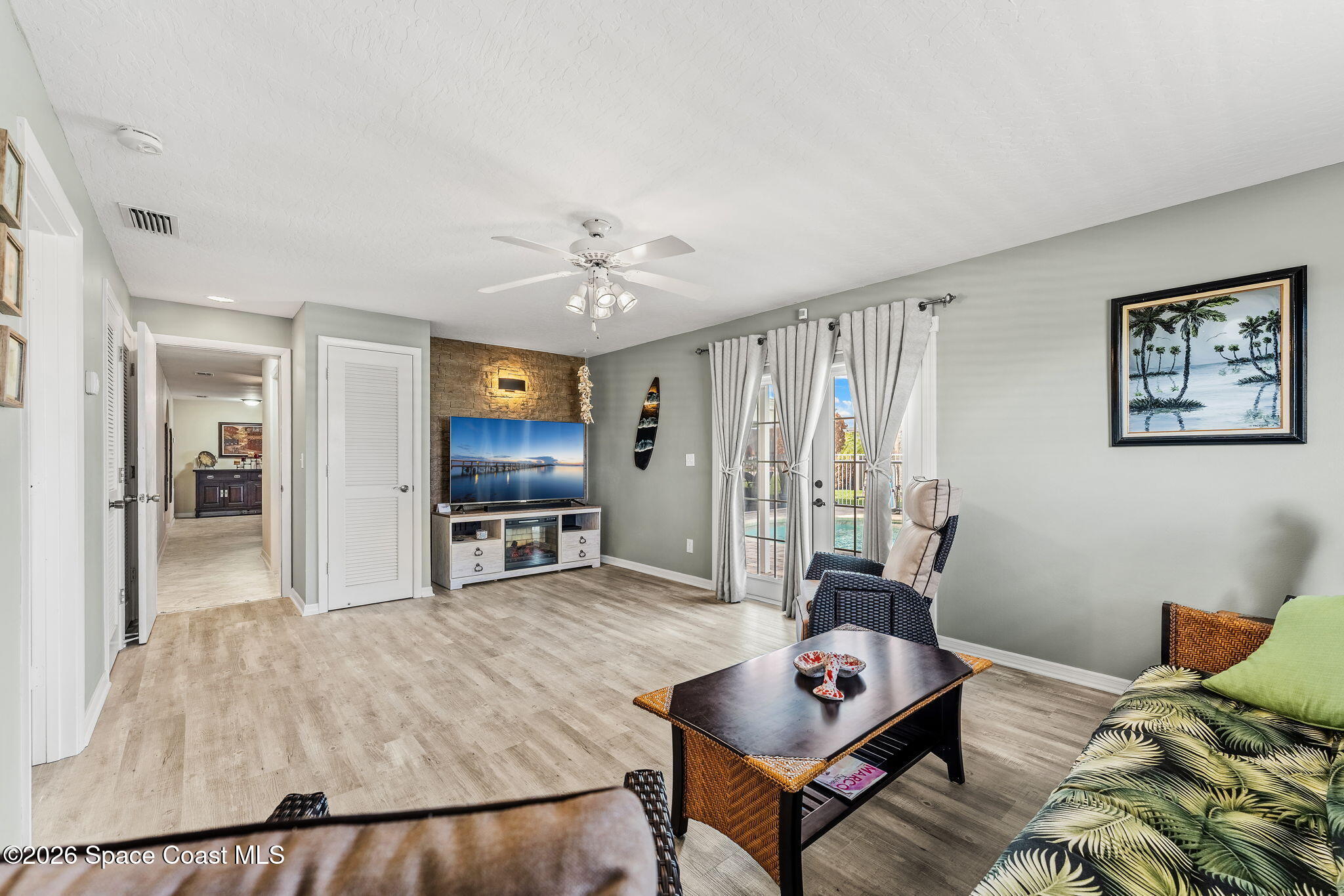 31 Fairway Drive Cocoa Beach, FL 32931 - Photo 28 of 53 a living room with furniture and wooden floor