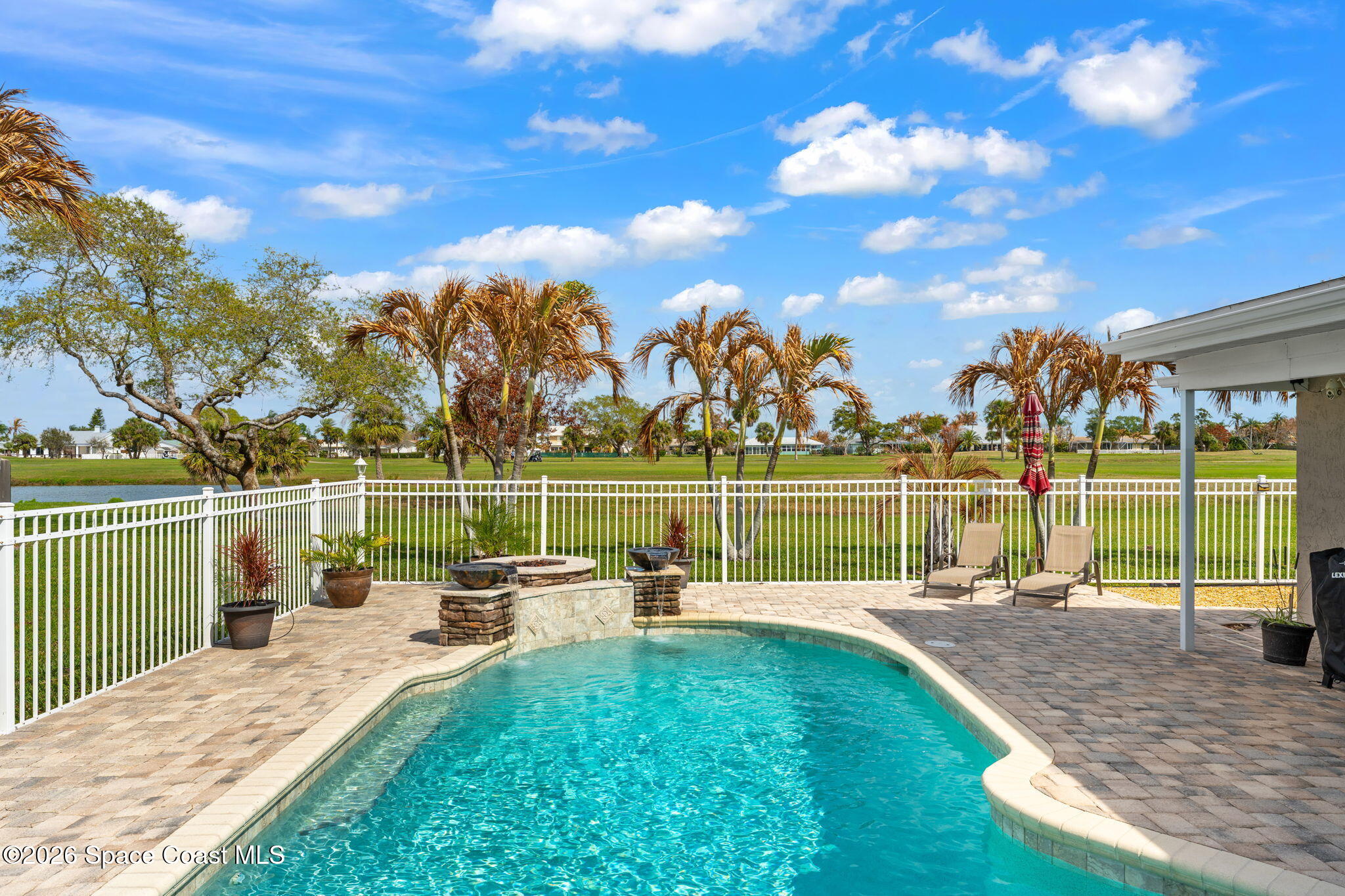 31 Fairway Drive Cocoa Beach, FL 32931 - Photo 41 of 53 a view of a lake