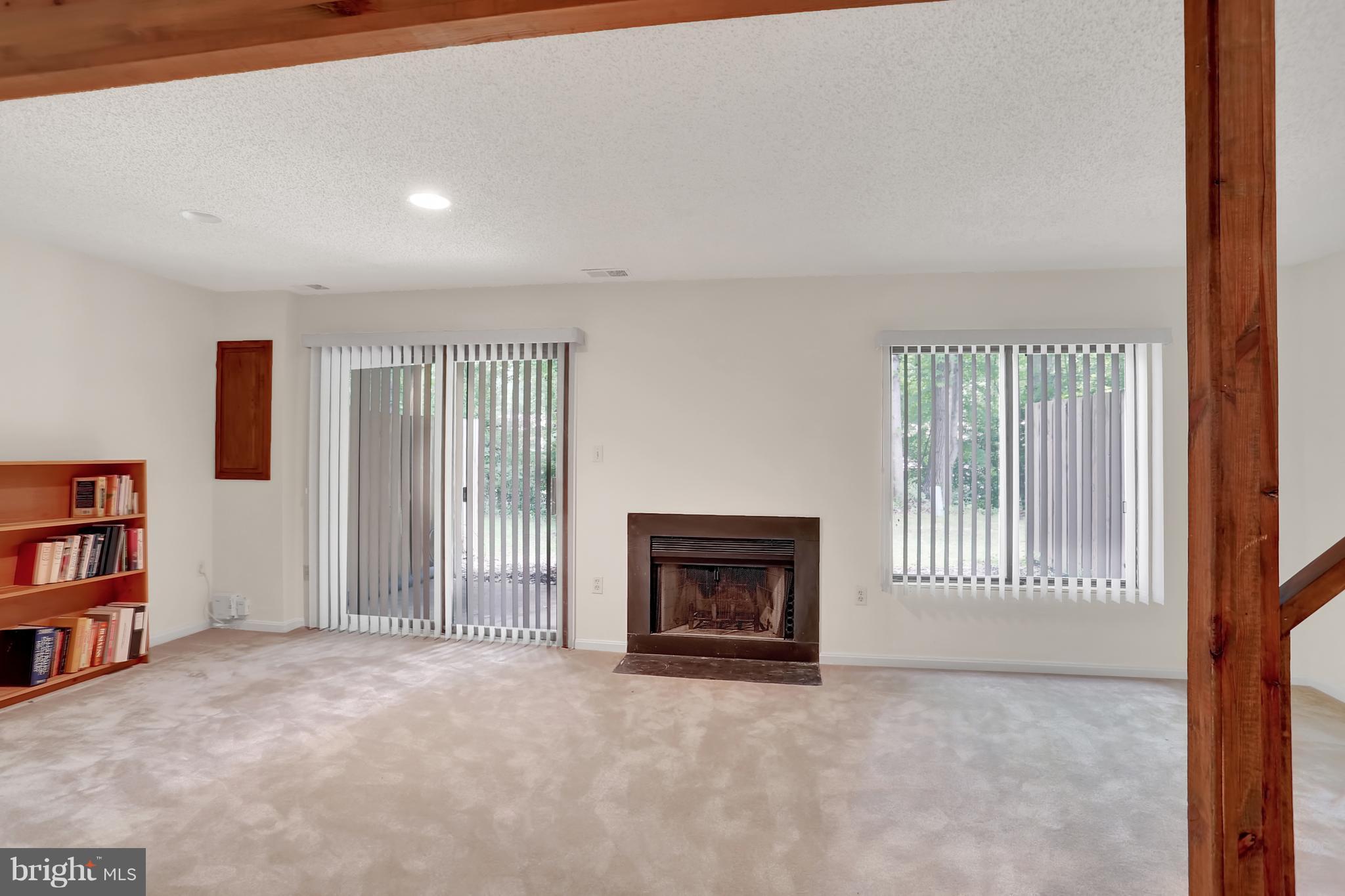 2305 Glade Bank Way Reston, VA 20191 - Photo 22 of 26 Walk-out lower level with cozy FP