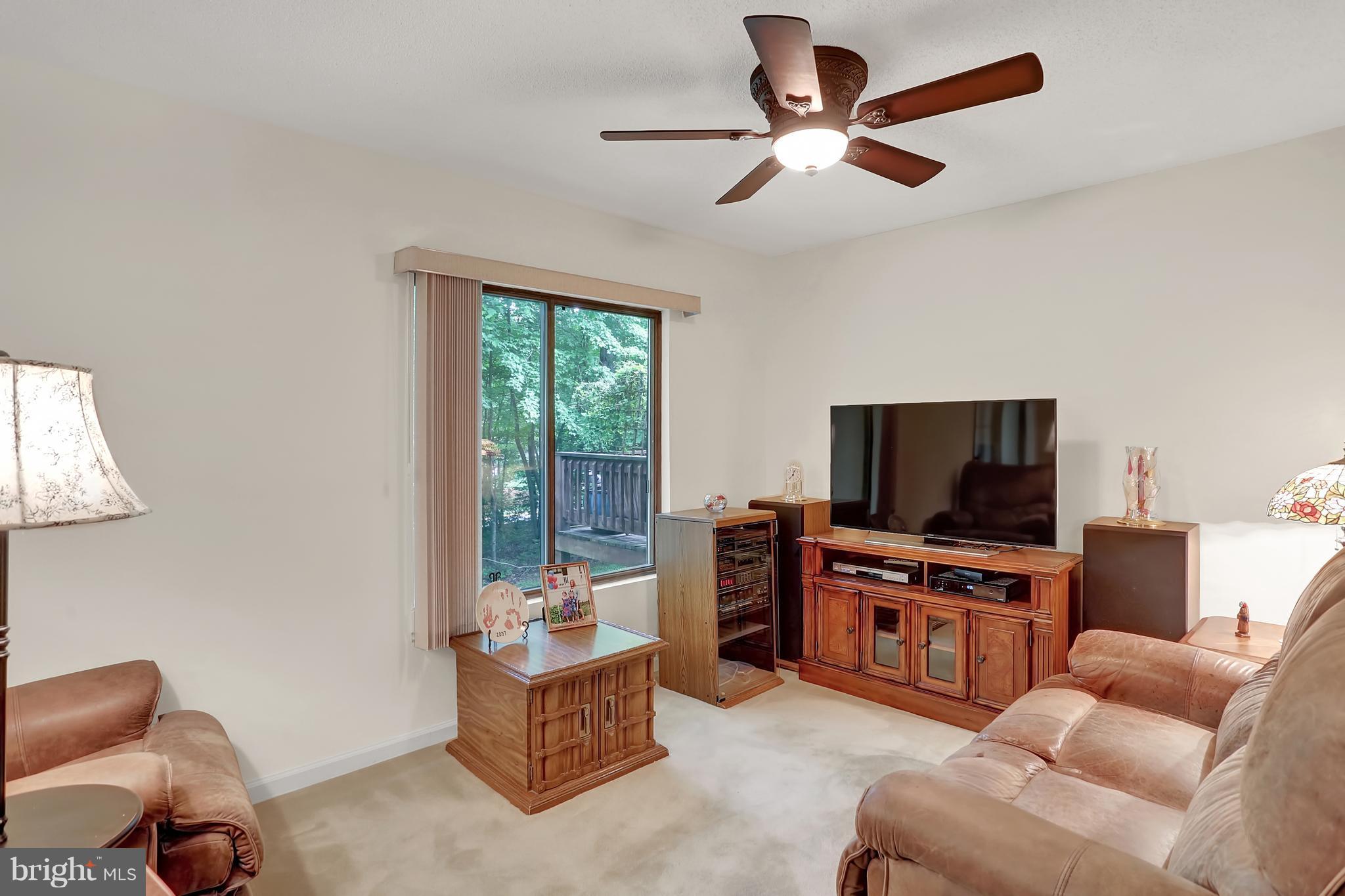 2305 Glade Bank Way Reston, VA 20191 - Photo 8 of 26 Living room with a view of the back