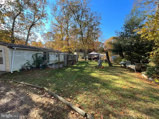 a view of a backyard with a garden