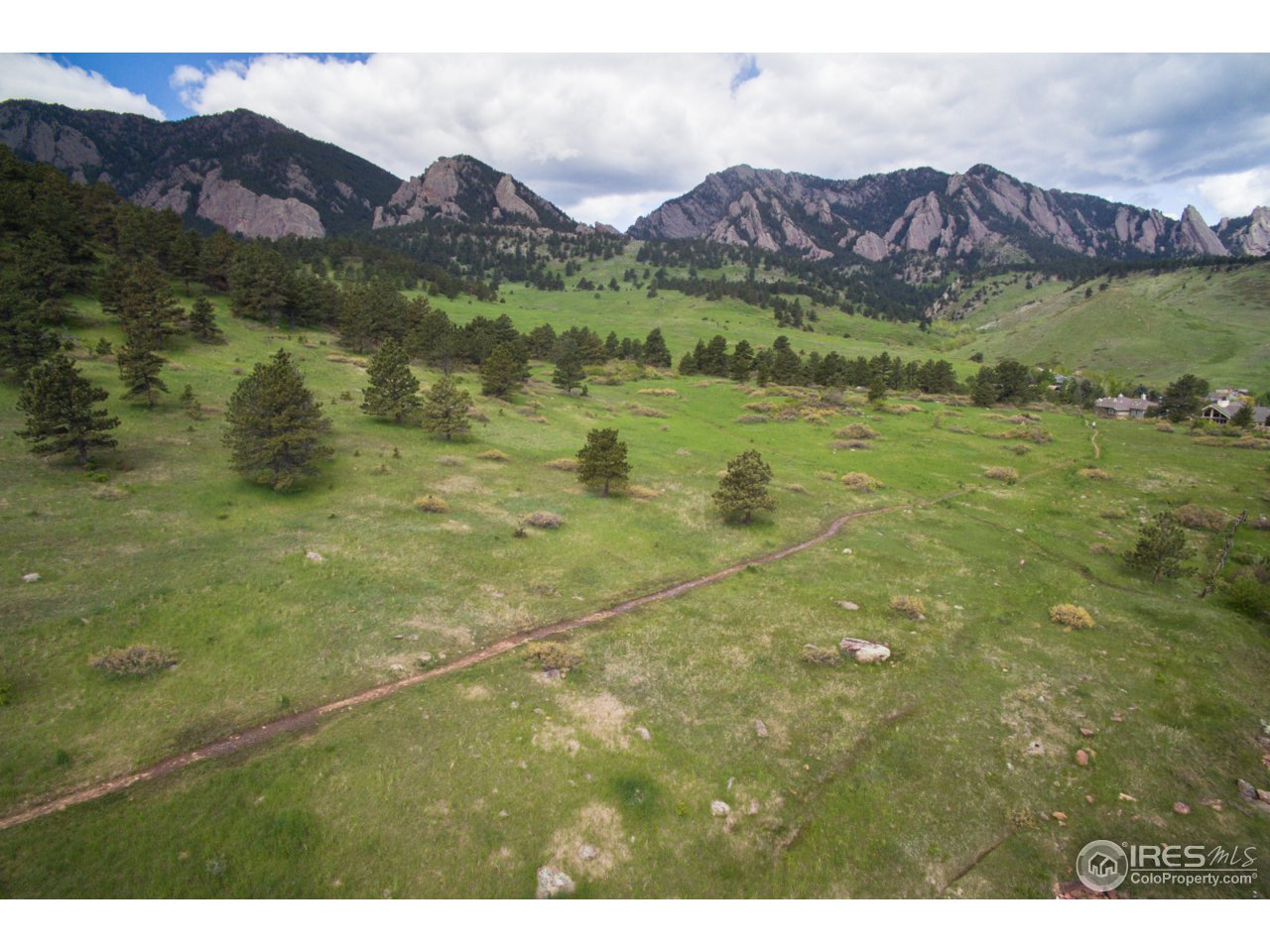 1755 View Point Road Boulder, CO 80305 - Photo 11 of 40 a view of a lush green hillside and a building