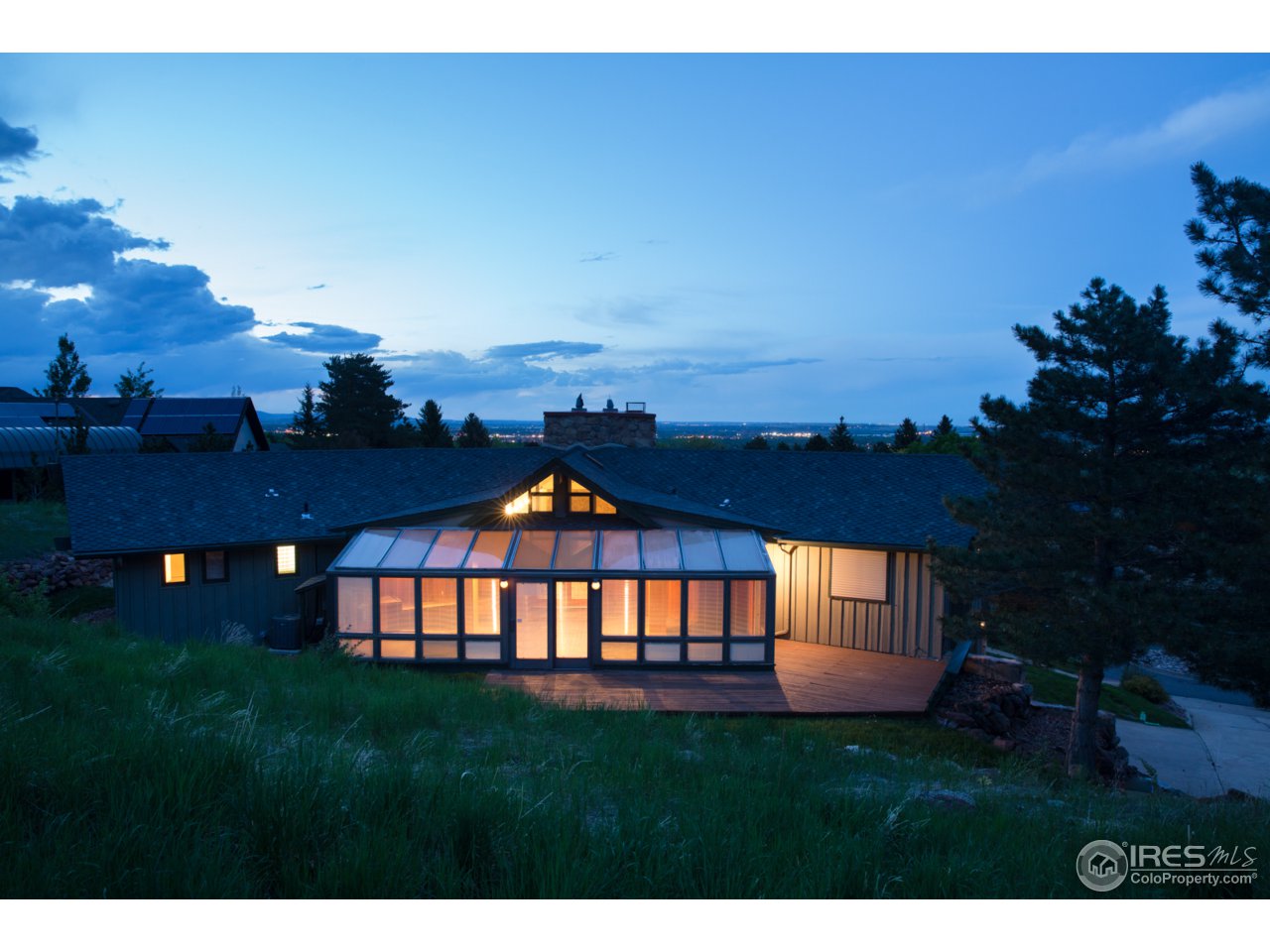 1755 View Point Road Boulder, CO 80305 - Photo 12 of 40 a front view of a house with a garden
