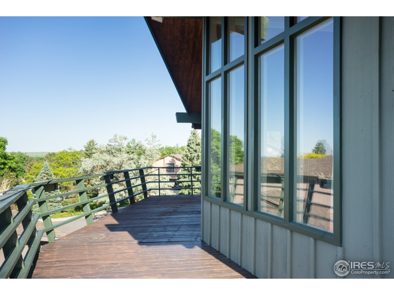 1755 View Point Road Boulder, CO 80305 - Photo 18 of 40 a view of balcony with wooden floor