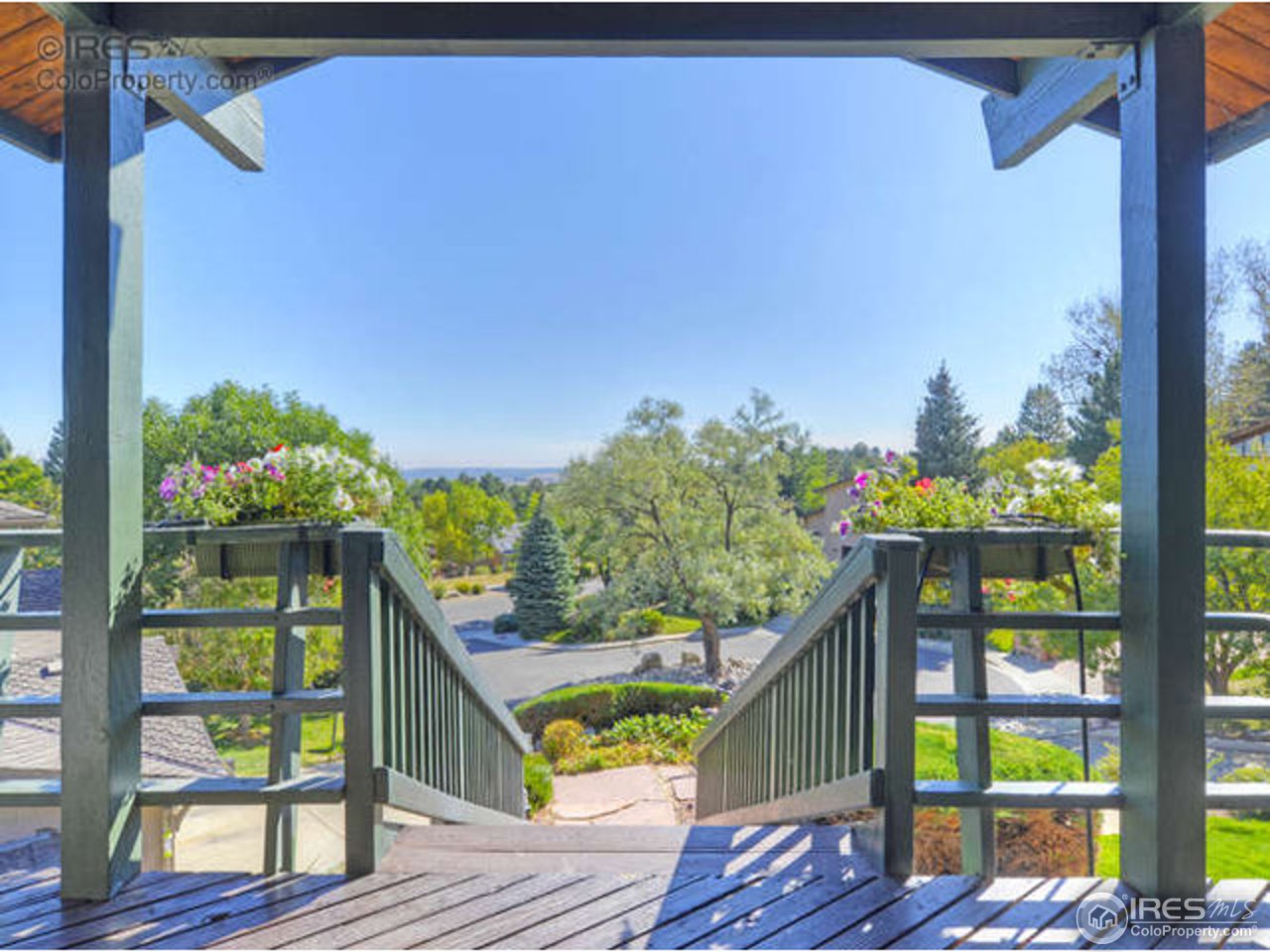 1755 View Point Road Boulder, CO 80305 - Photo 27 of 40 a view of balcony with wooden floor