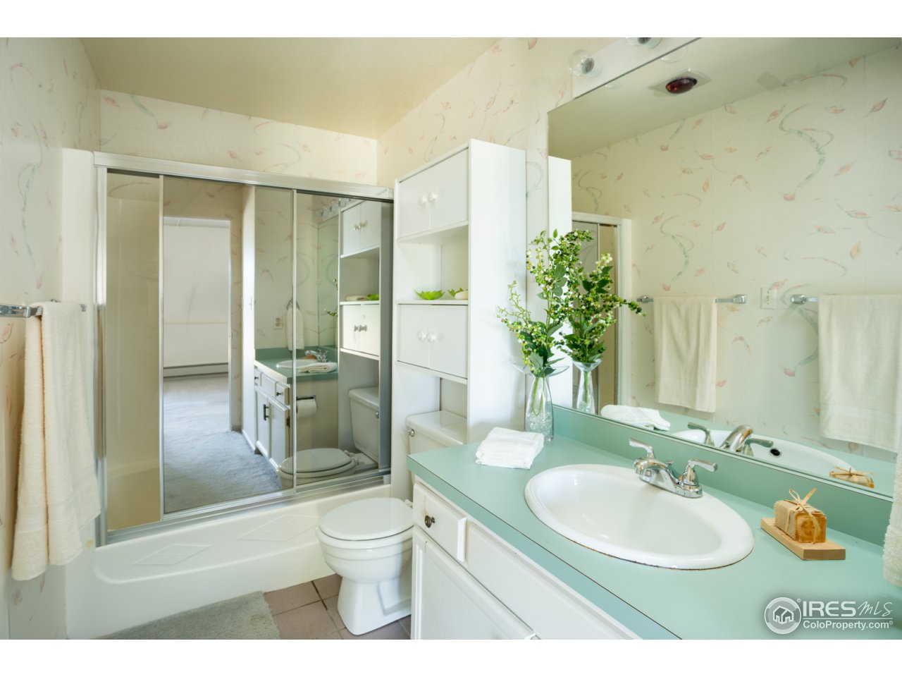 1755 View Point Road Boulder, CO 80305 - Photo 38 of 40 a bathroom with a sink a toilet and shower