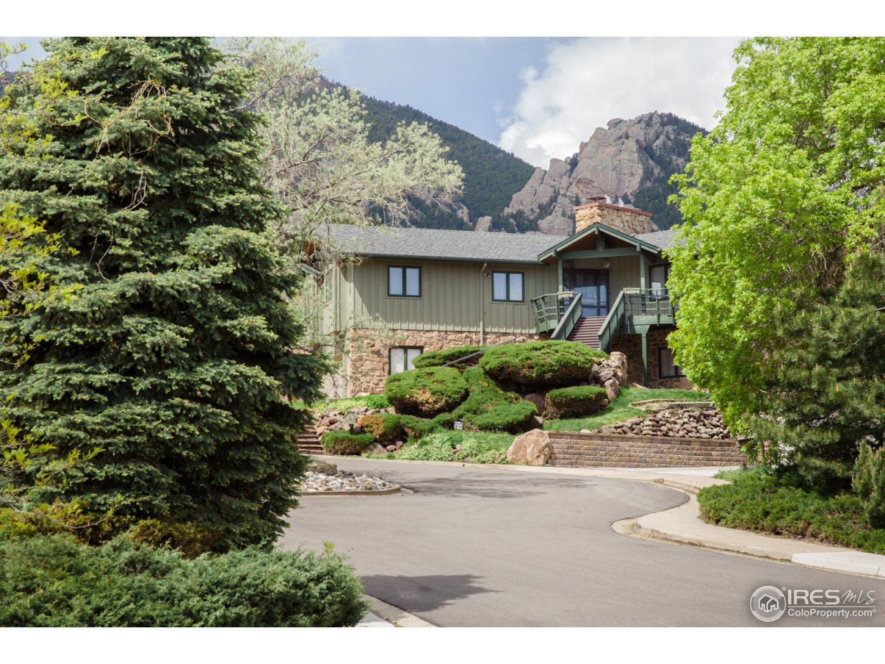 1755 View Point Road Boulder, CO 80305 - Photo 4 of 40 a front view of a house with a yard