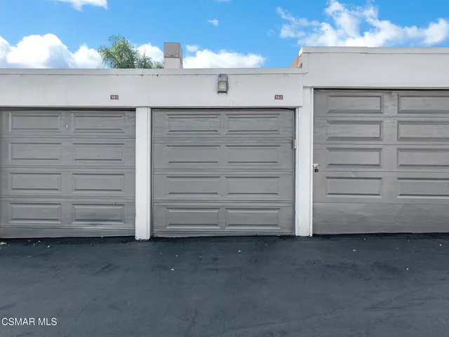 a view of a backyard of a house