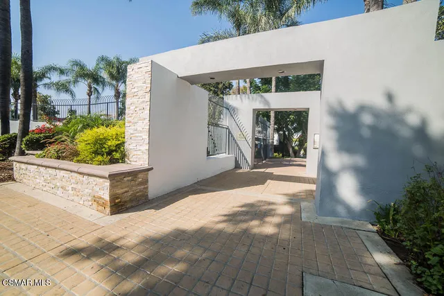 a view of a entrance gate of a house