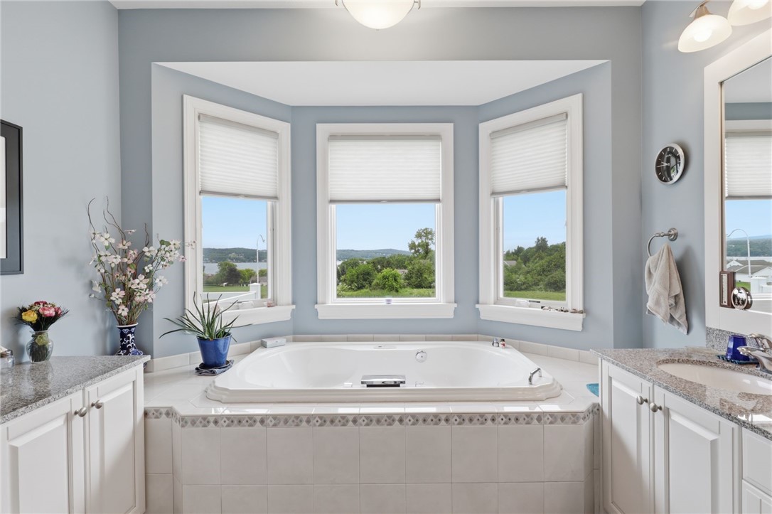 4536 Crystal Ridge Circle Gorham, NY 14424 - Photo 20 of 48 Jacuzzi soaking tub with scenic views of Canandaigua Lake.