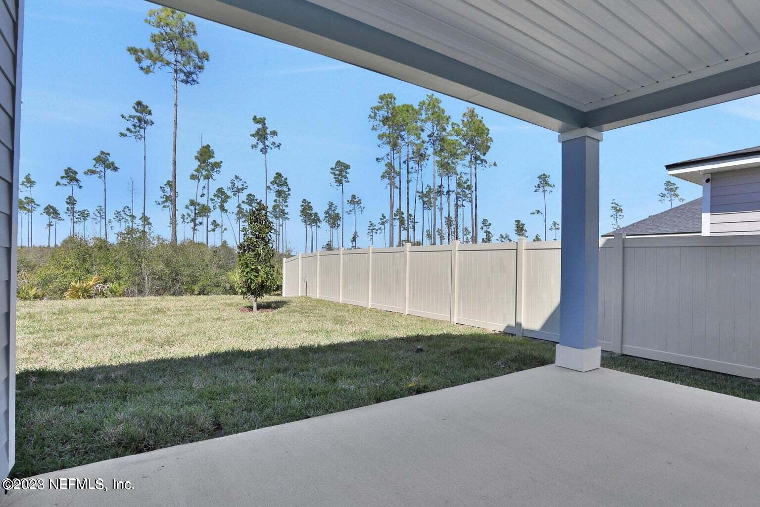 65 Torres Trace Street St. Augustine, FL 32095 - Photo 22 of 32 a view of a yard with an outdoor space