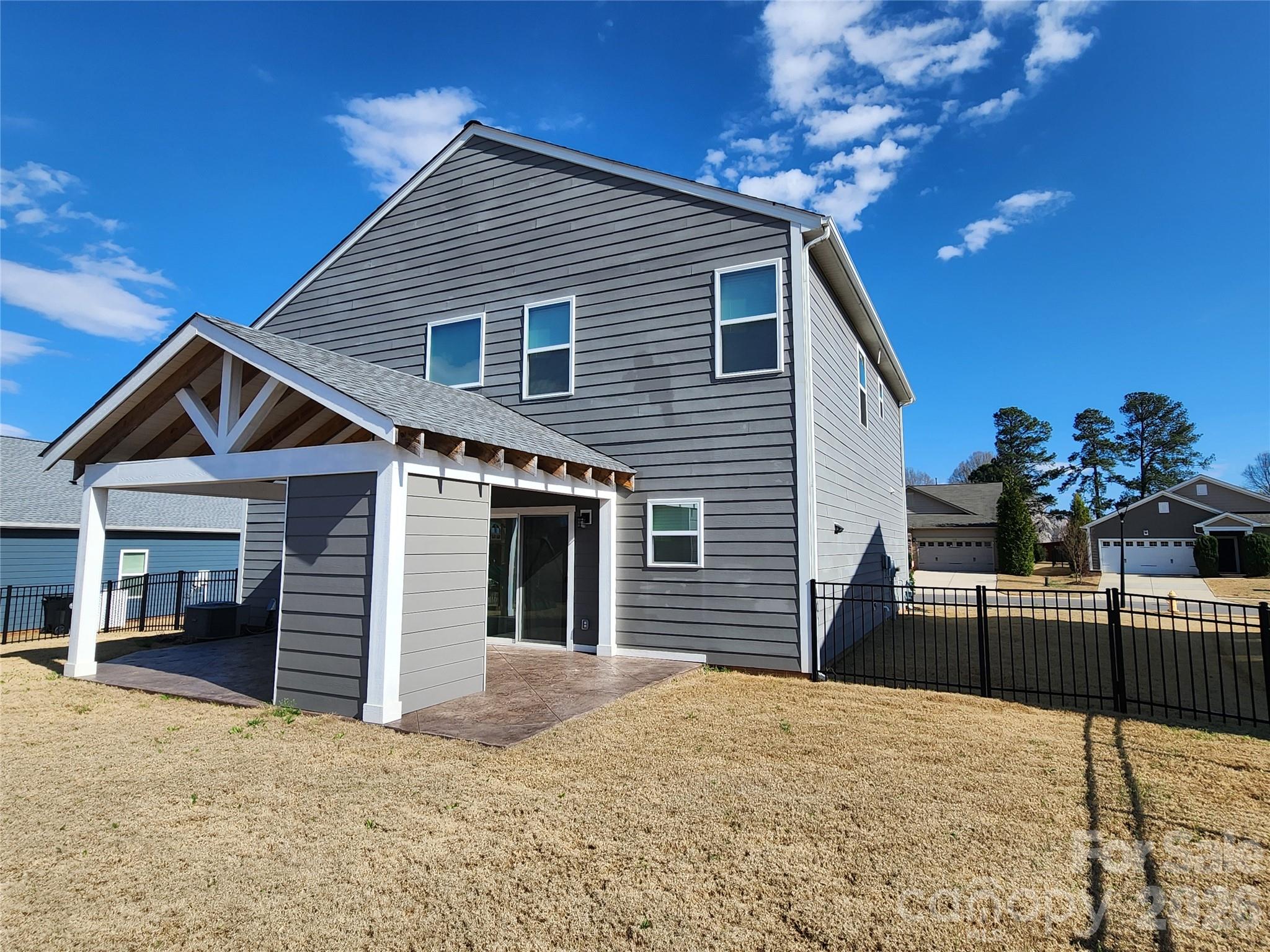 113 East Neel Ranch Road Mooresville, NC 28115 - Photo 5 of 6 a house view with a outdoor space