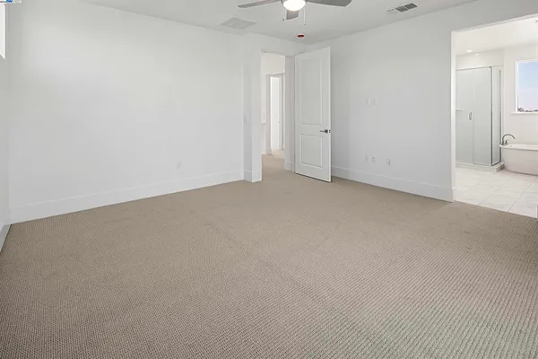 an empty room with a bathroom