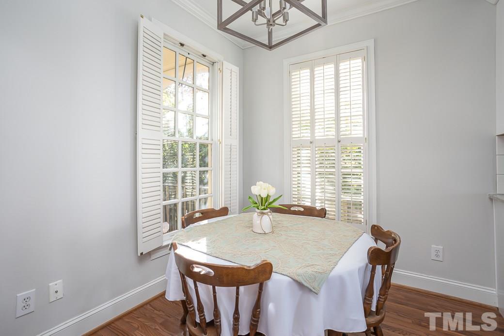 1305 Canfield Court Raleigh, NC 27608 - Photo 12 of 30 a view of a dining room with furniture and window