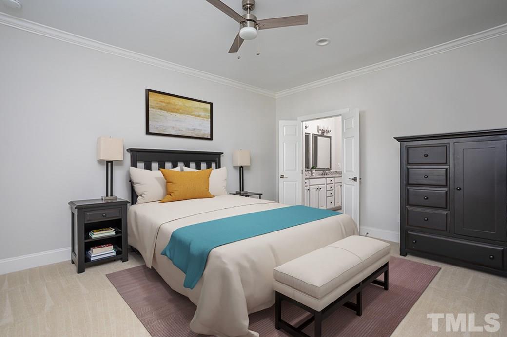 1305 Canfield Court Raleigh, NC 27608 - Photo 19 of 30 a bedroom with a bed and a couch