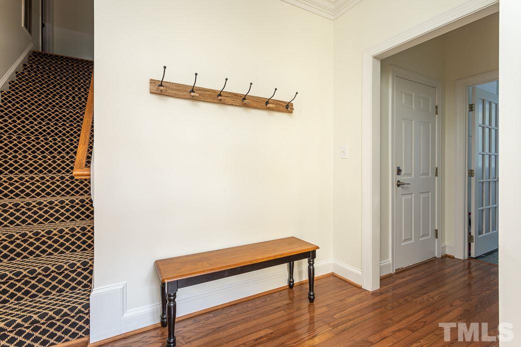 1305 Canfield Court Raleigh, NC 27608 - Photo 21 of 30 a view of a room with wooden floor