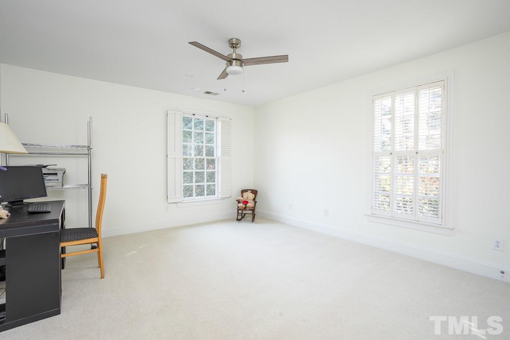 1305 Canfield Court Raleigh, NC 27608 - Photo 28 of 30 a view of an empty room with a window