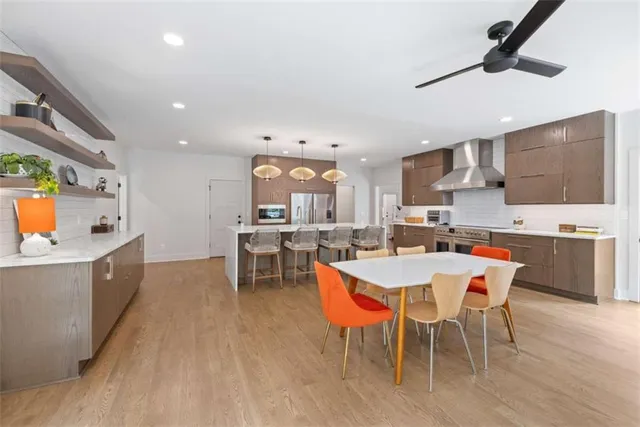 a spacious bedroom with a bed and a window