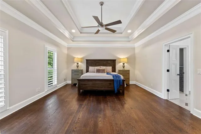 a view of a livingroom with chairs and a fireplace