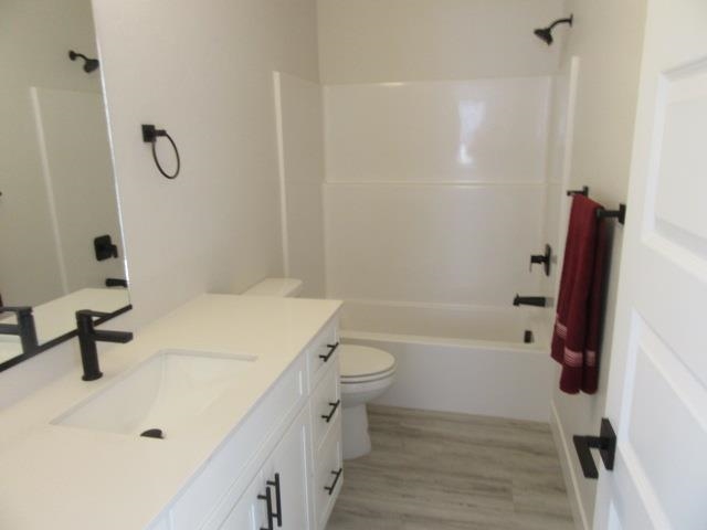 2468 Revere Road Grand Junction, CO 81505 - Photo 12 of 26 a bathroom with a sink a toilet and a bathtub
