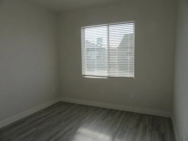 a bathroom with a mirror and a shower