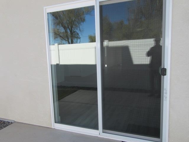2468 Revere Road Grand Junction, CO 81505 - Photo 24 of 26 a bathroom with a glass door