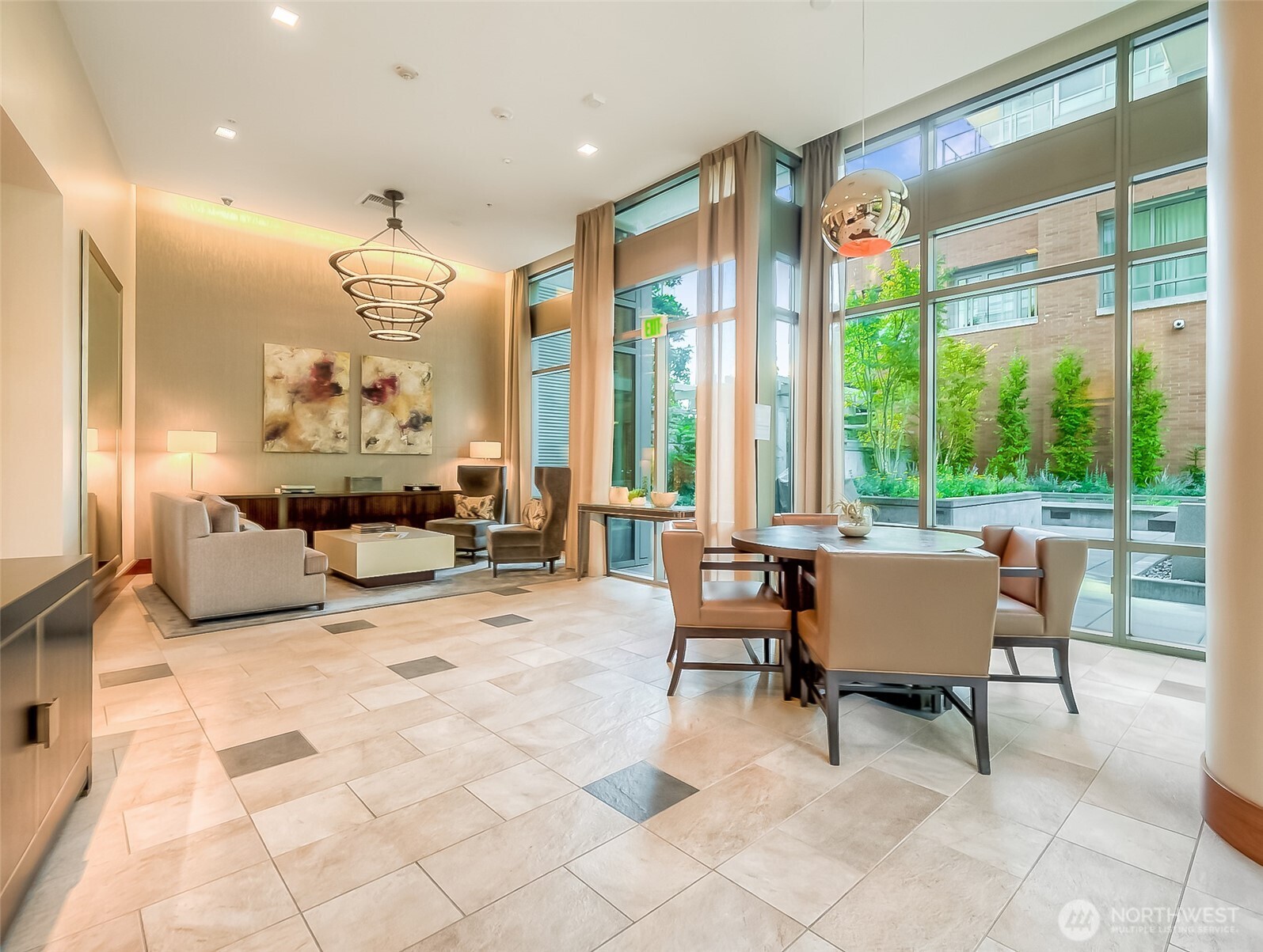 900 Lenora Street, Unit W803 Seattle, WA 98121 - Photo 22 of 29 a living room with furniture and large windows
