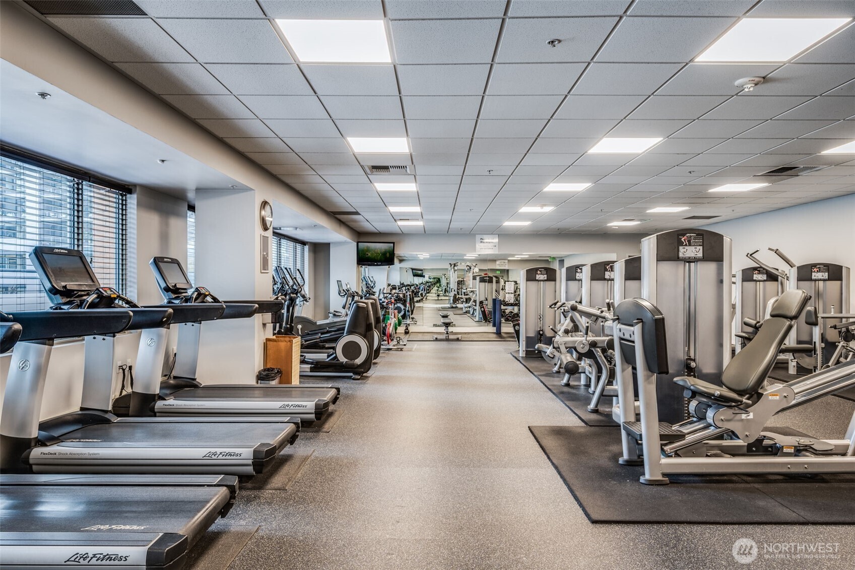 900 Lenora Street, Unit W803 Seattle, WA 98121 - Photo 24 of 29 a view of a room with gym equipment