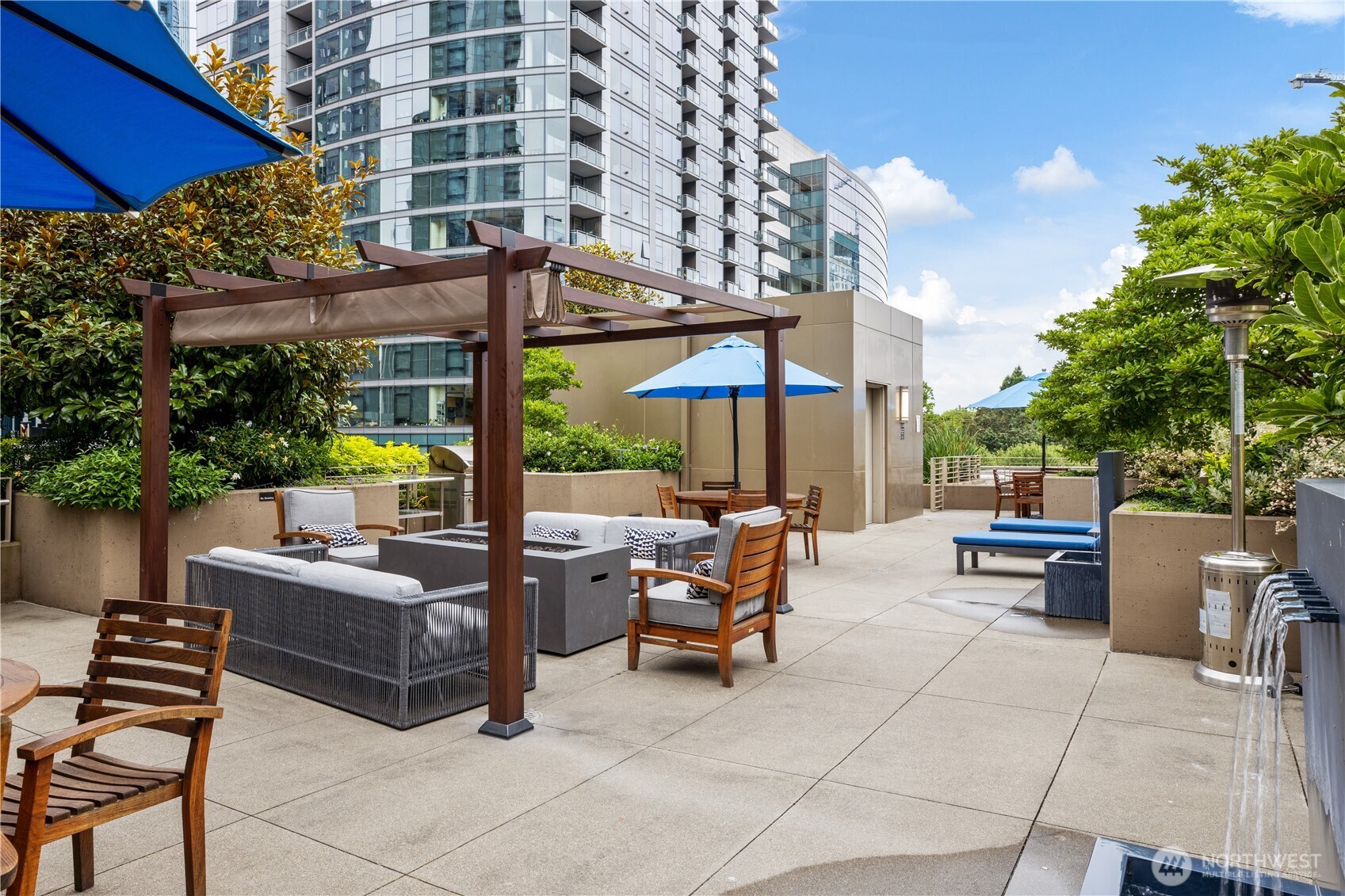 900 Lenora Street, Unit W803 Seattle, WA 98121 - Photo 26 of 29 a view of an outdoor sitting area with couch and table