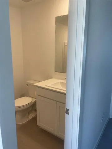 a bathroom with a toilet and a sink
