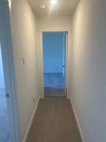 a view of hallway with closet