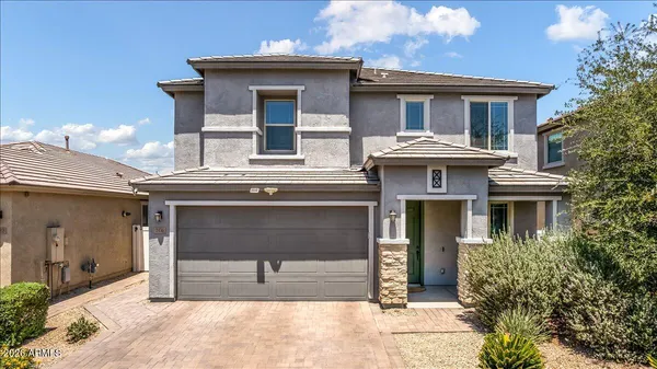 a house view with a outdoor space