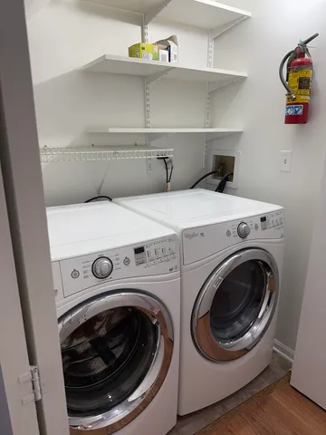 a view of a chairs and table in backyard of the house