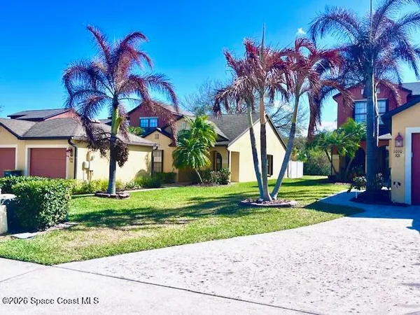 a view of a backyard with a garden
