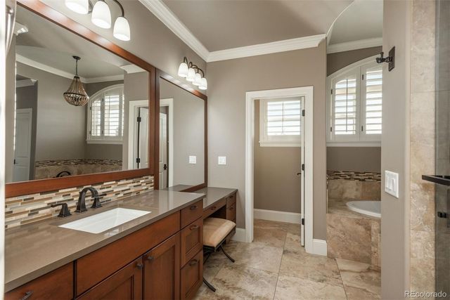 a bathroom with a sink double vanity and a mirror