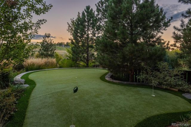 a view of a golf course with a garden
