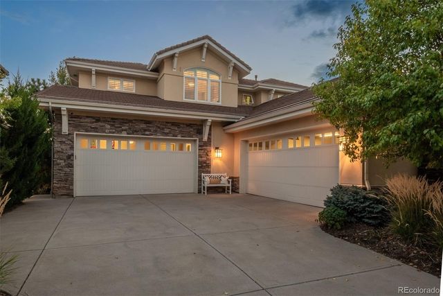 a view of a car garage of a house