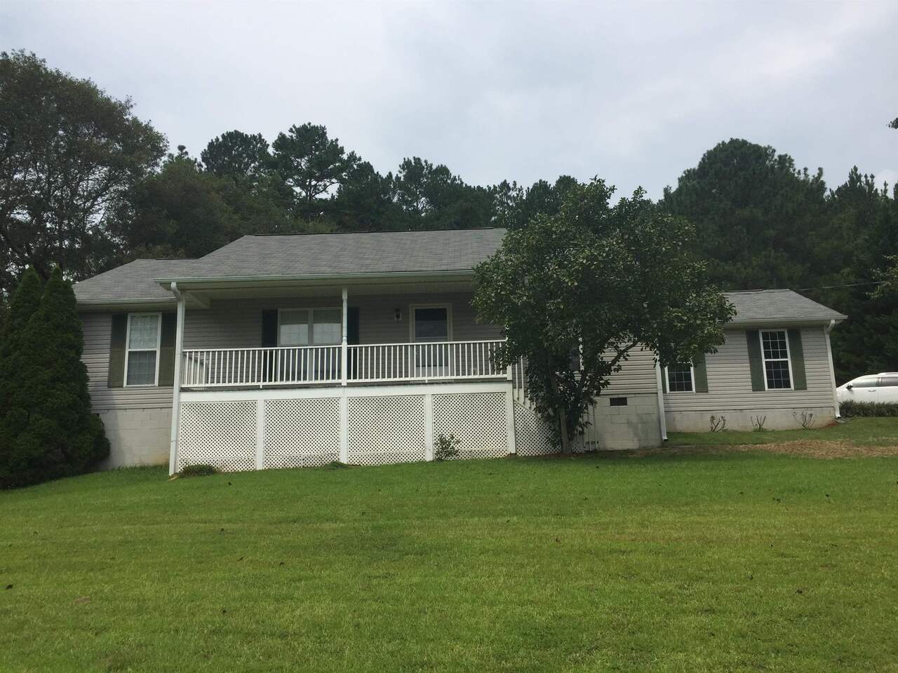 164 Canard Road Southeast Rome, GA 30161 - Photo 1 of 1 a house that is sitting in the grass