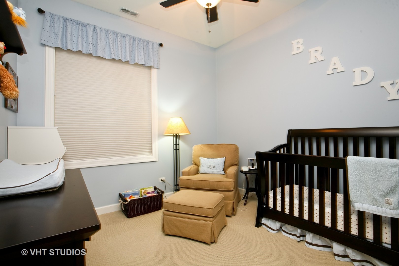 821 Foster Street, Unit 1S Evanston, IL 60201 - Photo 11 of 14 a living room with furniture and a rug