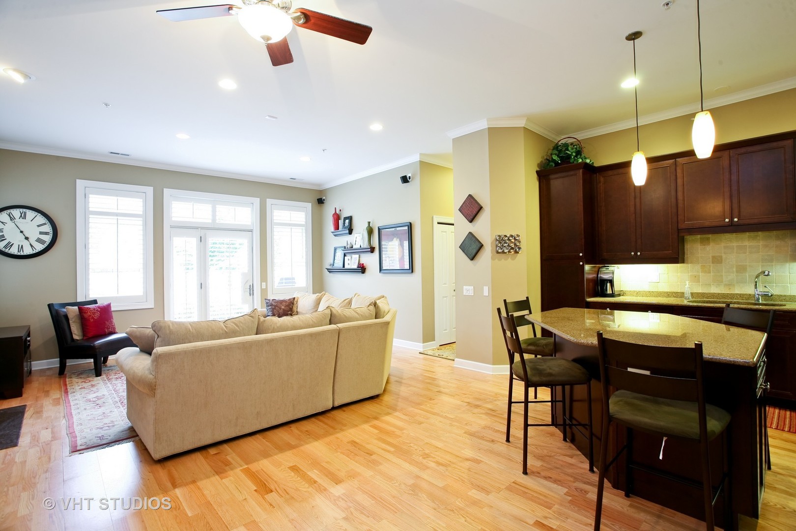 821 Foster Street, Unit 1S Evanston, IL 60201 - Photo 7 of 14 a living room with furniture and a wooden floor