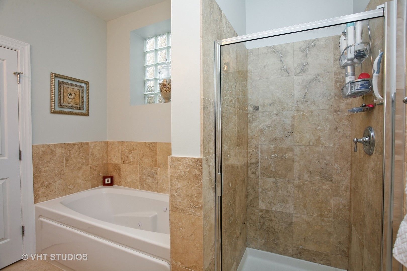 821 Foster Street, Unit 1S Evanston, IL 60201 - Photo 10 of 14 a bathroom with a bathtub and shower