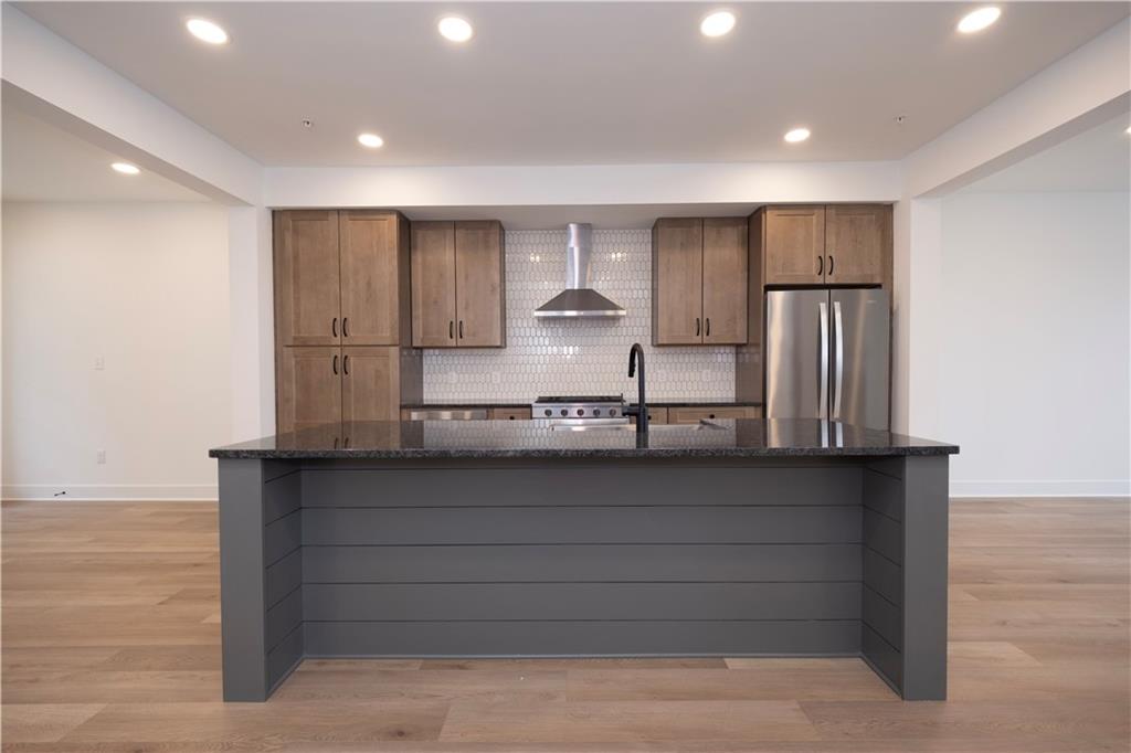 405 Ramsgate Road Cranberry Township, PA 16066 - Photo 11 of 50 a kitchen with stainless steel appliances granite countertop a refrigerator and a sink