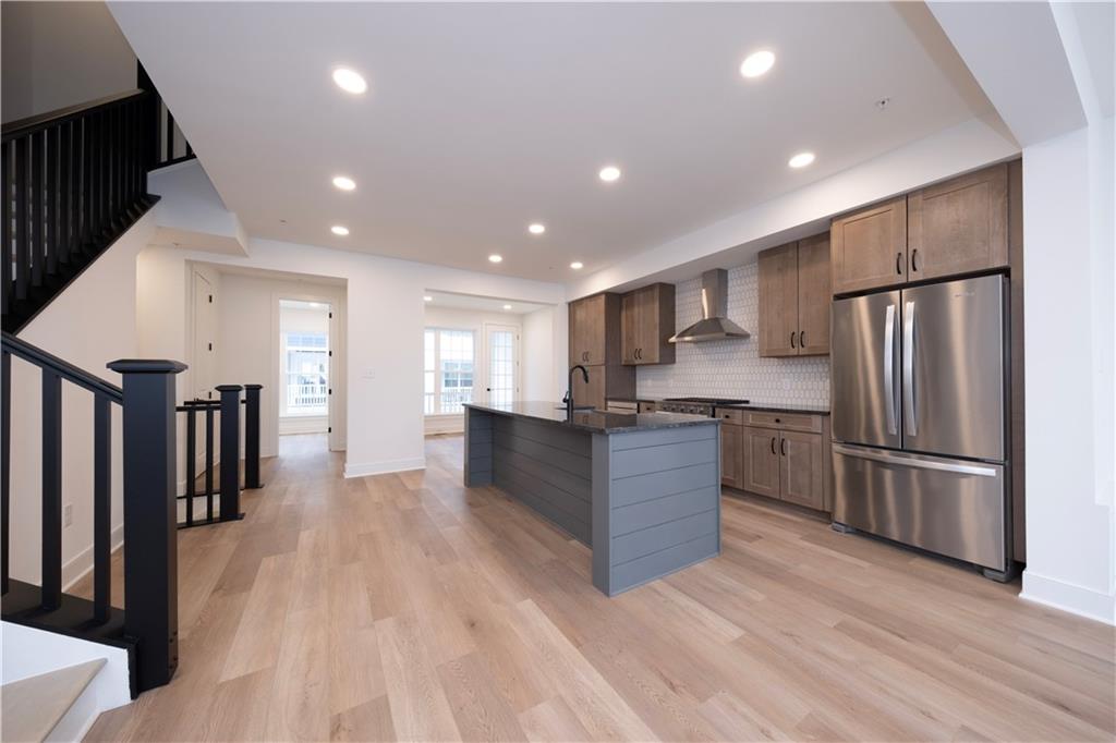 405 Ramsgate Road Cranberry Township, PA 16066 - Photo 13 of 50 a kitchen with stainless steel appliances granite countertop a refrigerator and a stove top oven
