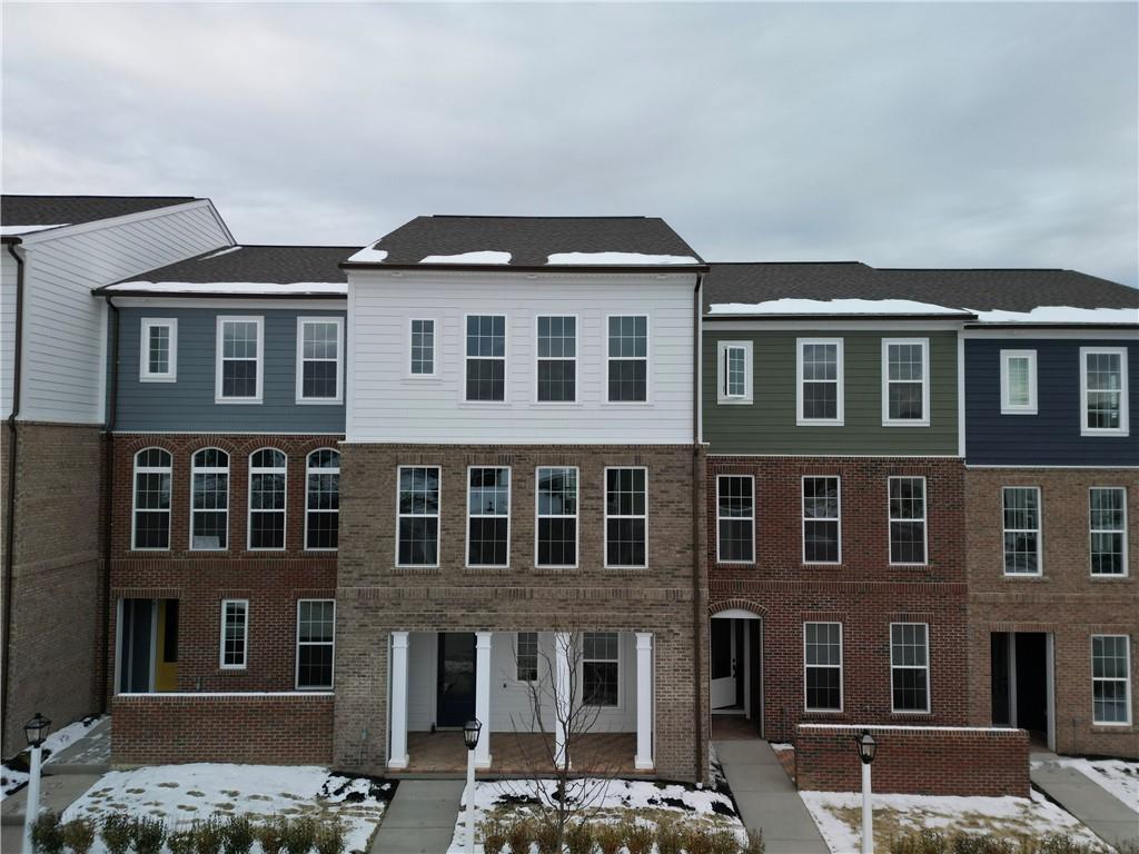 405 Ramsgate Road Cranberry Township, PA 16066 - Photo 2 of 50 a front view of a building with lot of cars and trees