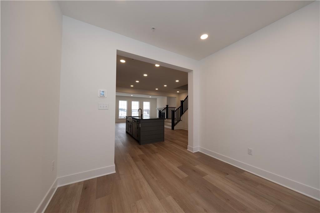 405 Ramsgate Road Cranberry Township, PA 16066 - Photo 22 of 50 wooden floor in an empty room with a window