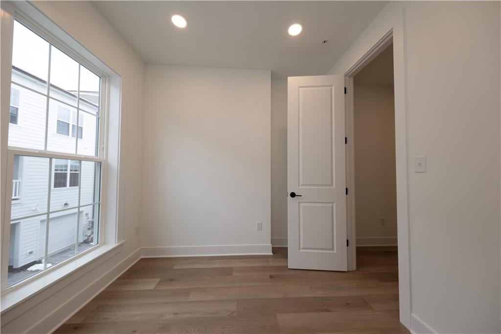 405 Ramsgate Road Cranberry Township, PA 16066 - Photo 25 of 50 a view of empty room with wooden floor and fan