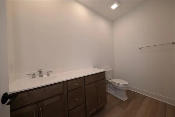 a bathroom with a bathtub a shower and a sink