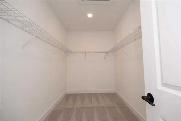 a view of a room with racks on the wall